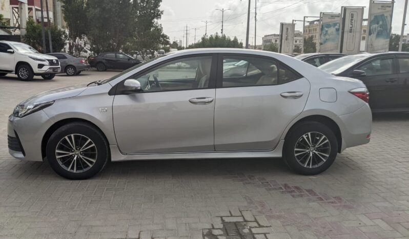 IMMACULATE CONDITION COROLLA ALTIS AT 2018, SILVER COLOR, ONLY 95,000KM DRIVEN,WITH 6 MONTHS OR 10,000KM WARRANTY ON ENGINE AND GEARBOX. full