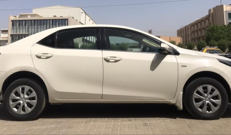 IMMACULATE CONDITION COROLLA GLI MT 2019, WHITE COLOR, ONLY 25,000KM DRIVEN,WITH 6 MONTHS OR 10,000KM WARRANTY ON ENGINE AND GEARBOX. full